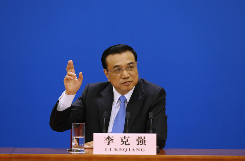 3月15日，國務(wù)院總理李克強在北京人民大會堂與中外記者見面，并回答記者提問。 新華社記者 沈伯韓 攝