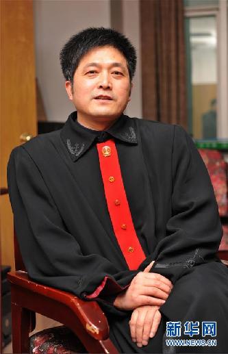 （圖文互動(dòng)）其人如蘭，既潔且馨——追記“全國模范法官”胡國運(yùn)