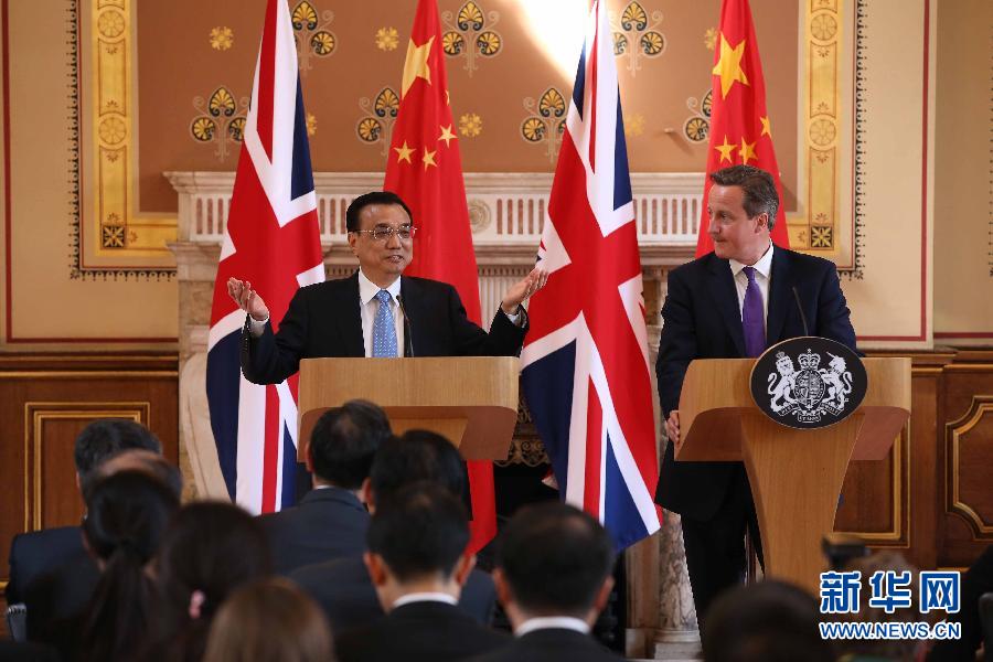 6月17日，國務院總理李克強同英國首相卡梅倫在倫敦舉行中英總理年度會晤后共同會見記者。新華社記者 龐興雷 攝