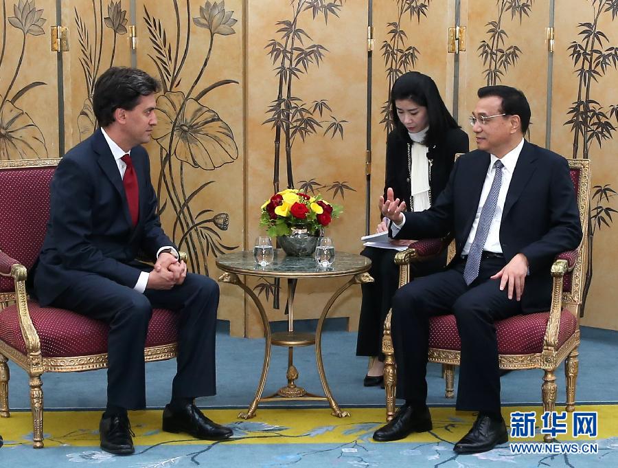 6月18日，國(guó)務(wù)院總理李克強(qiáng)在倫敦會(huì)見(jiàn)英國(guó)工黨領(lǐng)袖埃德·米利班德。新華社記者 龐興雷 攝
