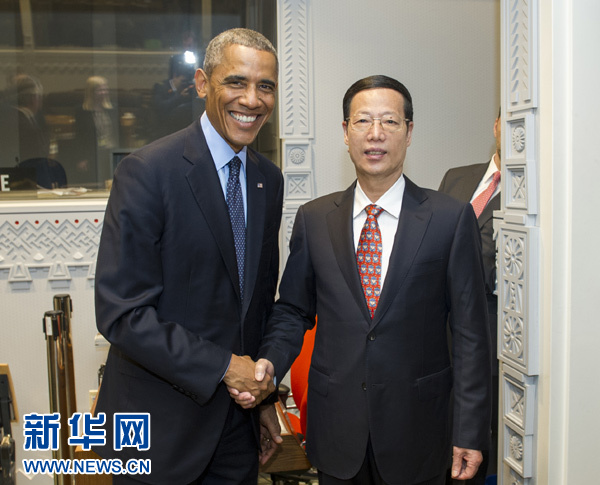 9月23日，國家主席習(xí)近平特使、國務(wù)院副總理張高麗在紐約會見出席聯(lián)合國氣候峰會的美國總統(tǒng)奧巴馬。 新華社記者王曄攝