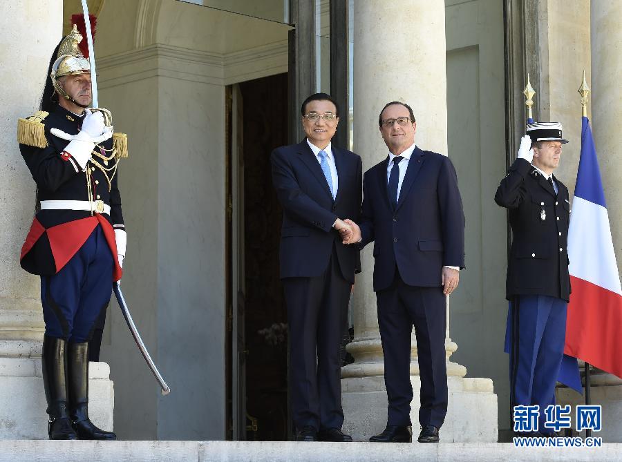 當?shù)貢r間6月30日下午，國務(wù)院總理李克強在巴黎愛麗舍宮會見法國總統(tǒng)奧朗德。 新華社記者李學仁攝