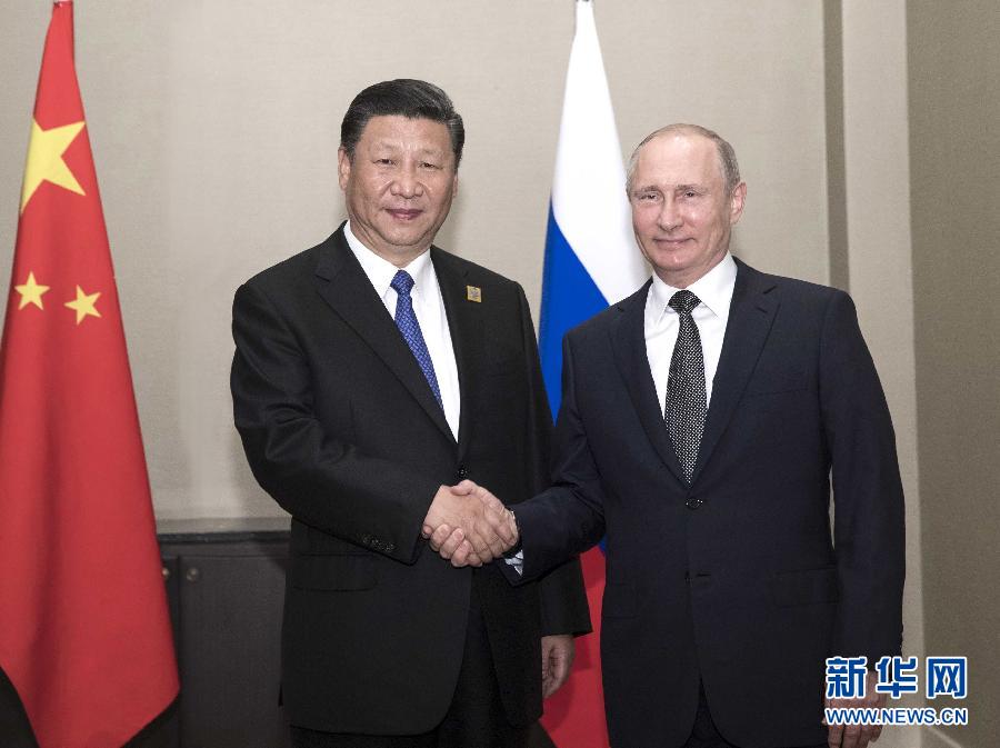 6月8日，國家主席習(xí)近平在阿斯塔納會(huì)見俄羅斯總統(tǒng)普京。 新華社記者蘭紅光 攝