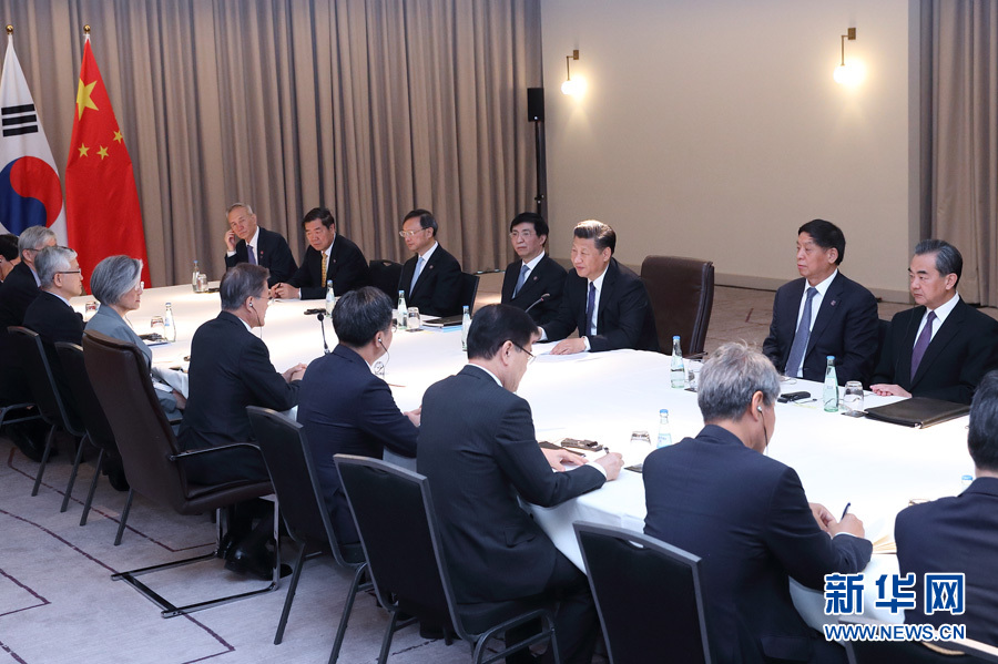7月6日，國家主席習近平在柏林會見韓國總統(tǒng)文在寅。 新華社記者 王曄攝