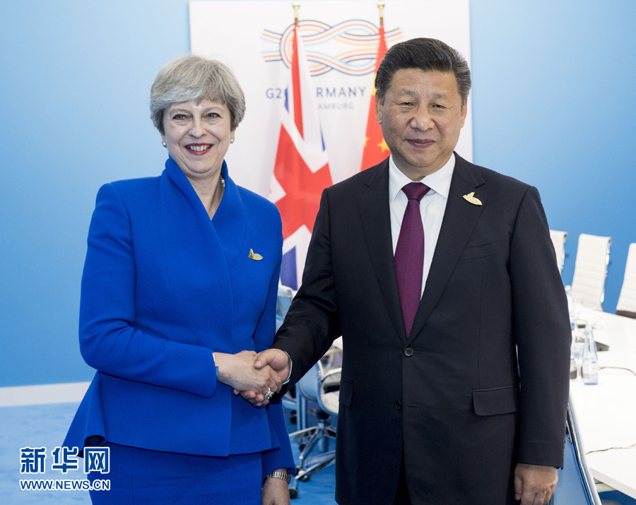 7月7日，國家主席習近平在漢堡會見英國首相特雷莎·梅。 新華社記者李學仁 攝